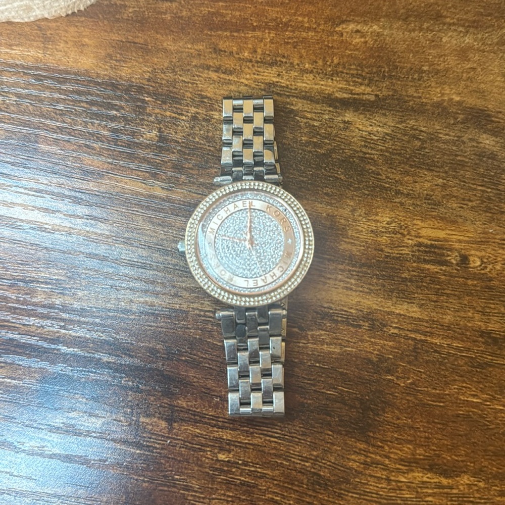 Silver Michael Kors watch with rose gold dial